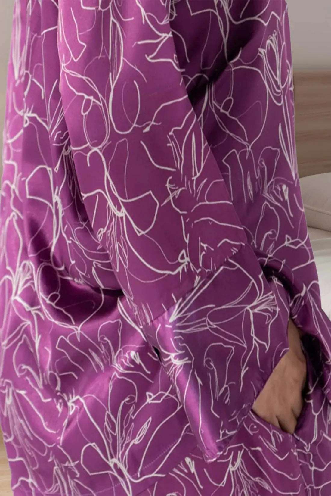 Features a luxurious purple print with a silky finish women’s pajama set