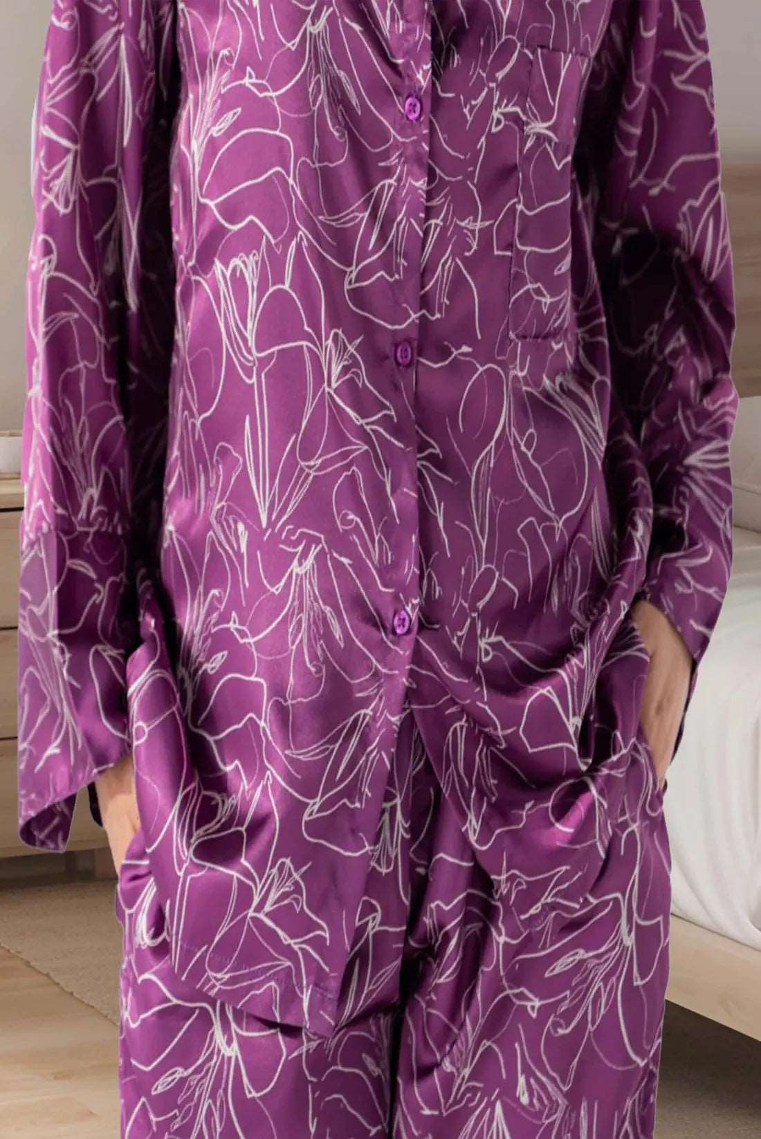 Features a luxurious purple print with a silky finish women’s pajama set