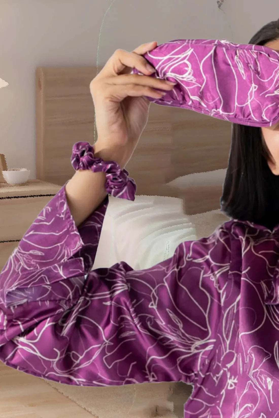 Features a luxurious purple print with a silky finish women’s pajama set